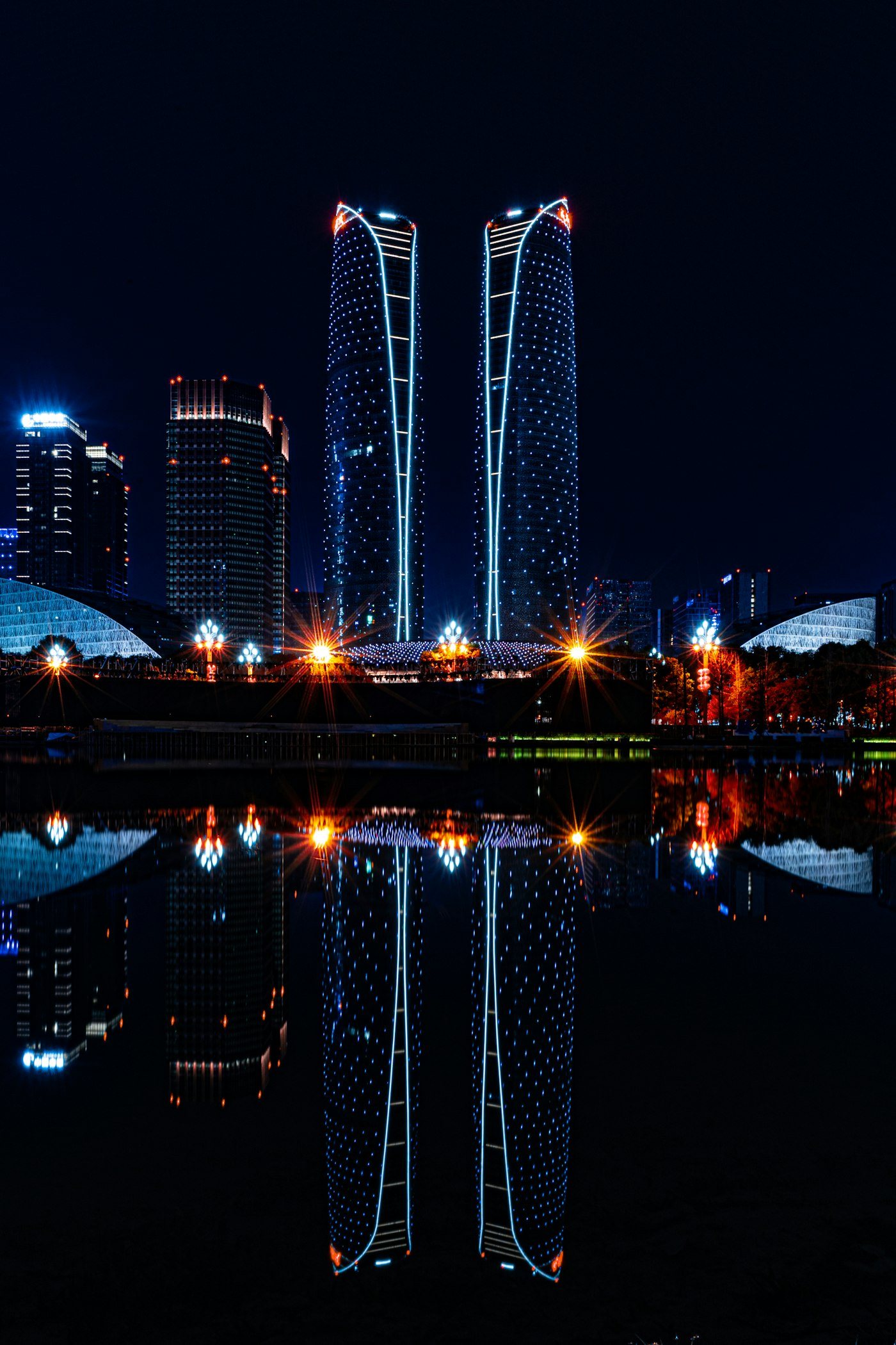 Chengdu Financial City twin towers lit up at night